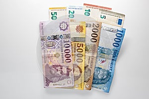 4 Euro and Forint banknotes in denominations of 5, 10, 20 and 50 euros, as well as 1000, 2000, 5000 and 10000 forints