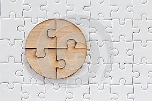 4 Four brown pieces of puzzle on a white jigsaw background, last piece of jigsaw puzzle to complete the mission, Business