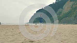 4 k beautifull young girl, mother walking and taking time with her cute little baby, among the Cantabrian coast, in the