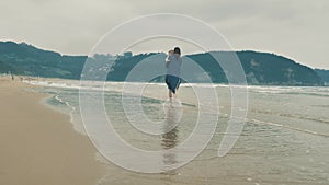 4 k beautifull young girl, mother walking and taking time with her cute little baby, among the Cantabrian coast, in the