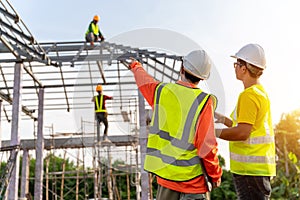 4 Workers in Construction Site, Industrial Building Construction Site. Real Estate Project with Civil Engineer of Workers Steel