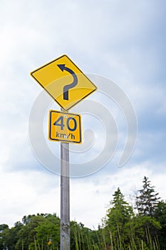 40 km/h Caution Road Sign Post