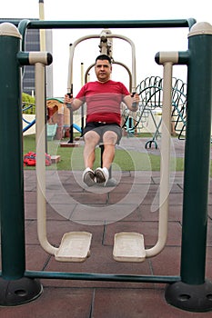 40-year-old man exercises on the roof garden of his building with effort and commitment to lose weight and improve his health