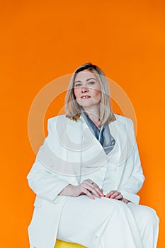 40 year old woman in business suit in office