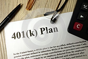 401k Plan with calculator pen and glasses