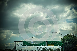 405 south freeway sign under a cloudy sky