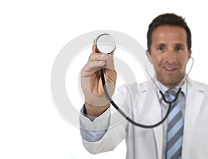 40s attractive male medicine doctor in medical gown with close up hand holding stethoscope smiling happy