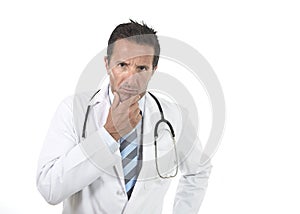 40s attractive male medicine doctor with stethoscope wearing medical gown in worried and stress