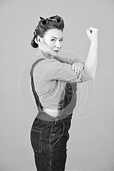 40s beautiful woman in retro pinup style with powerful gesture We Can Do IT.