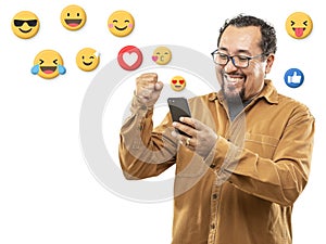 40s man with emojis on his smartphone