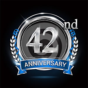 42nd silver anniversary logo with blue ribbon and ring