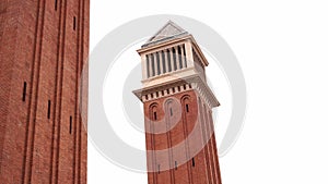 47-meter Venetian towers on the Plaza de La Liga in Barcelona against the sky.