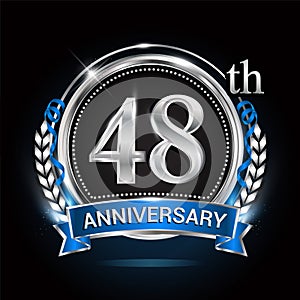 48th silver anniversary logo with blue ribbon and ring.48