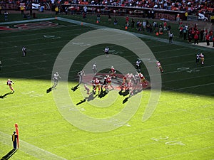 49ers in motion with Alex Smith looking to throw