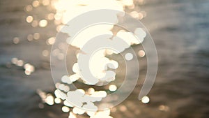 4K Abstract background blurry sea beach bokeh with light and glittering