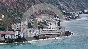 4K Aerial drone shot of Malibu Beach coastline in California with the blue Pacific Ocean