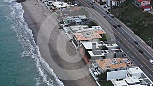 4K Aerial drone shot of Malibu Beach coastline in California with the blue Pacific Ocean