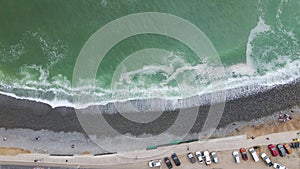 4K Aerial Drone Top Down Descend over Rocky Beach in Lima, Peru