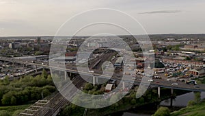 4K aerial following a passenger train into the city of Doncaster