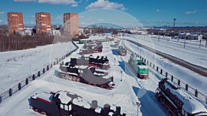 4K Aerial Footage of the Winter View to Old Steam Locomotives in the snowy Nizhny Novgorod city,