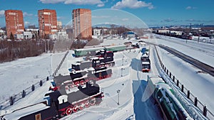 4K Aerial Footage of the Winter View to Old Steam Locomotives in the snowy Nizhny Novgorod city,