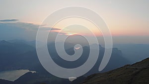 4K aerial sunset at Schafberg peak Salzkammergut