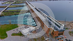 4K aerial view of the Beauharnois Hydroelectric Generating Station along the Saint Lawrence Seaway on the Saint Lawrence River, in