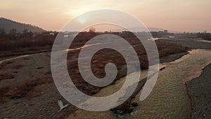 4K Aerial view of Moldova River also called as Ozana from Romania in Targu Neamt city during a spring sunrise