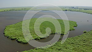 4K Aerial view over a beautiful lake from Danube Delta Romania during a sunny day