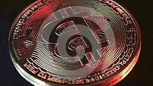 4K BTC coin rotating close up dark background