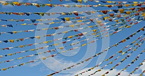 4k buddhist white stupa & flying prayer flags in shangrila yunnan,china.