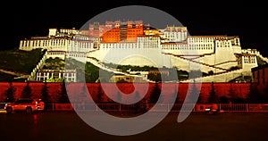 4k busy traffic in front of the Potala at night in Lhasa,Tibet.