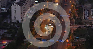 4k busy urban traffic on overpass at night,urban morden building,QingDao china.