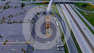 4K camera drone view of the contruction site of the REM Metropolitan Express Network along Highway 40 in Pointe Claire, Montreal