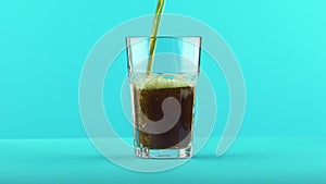 4K close-up shot of fizzy cola soda cold beverage drink pooring into faceted glass on colored blue background in studio