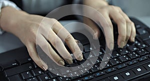 4K: A Closeup view from fast typing female hands on a black keyboard.