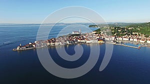 4K Compilation Video. Flight over old city Piran in Slovenia at sunset, aerial panoramic view.