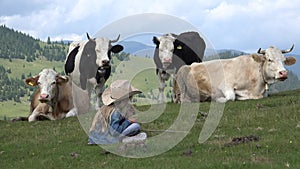 4K Cowherd Child Pasturing Cows, Farmer Girl Smelling Flowers on Grass Meadow