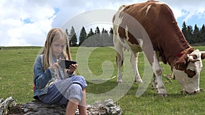 4K Cowherd Child Playing Tablet, Pasturing Cows, Girl Using Smart Phone, Cattle