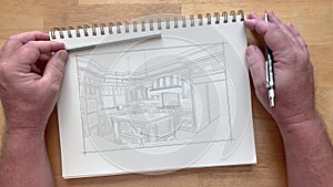 4k custom kitchen photo appears over artist drawing on pad of paper