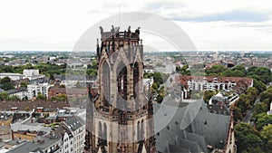 4k drone footage circling the historical tower of the Great Saint Martin Church in Cologne, Germany.