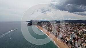 4K Drone Footage. Lloret De Mar. Aerial View Of Buildings City, Beach. Costa Brava. Spain