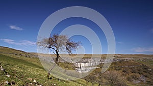 4k drone footage of Malham Cove a limestone landmark in the Yorkshire Dales National Park, UK