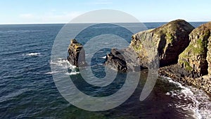 4k drone footage of the small harbour at Latheronwheel on the coast of Caithness, Scottish Highlands