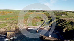 4k drone footage of the small harbour at Latheronwheel on the coast of Caithness, Scottish Highlands