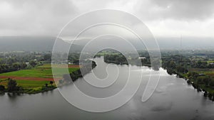 4K Drone shot aerial view scenic landscape of river at countryside and field farm