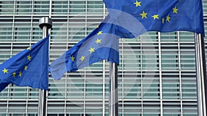 4K. European Union flags in a row waving in the wind, European Commission