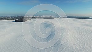 4K. Flight above snow fields in winter, aerial view (Snow desert)