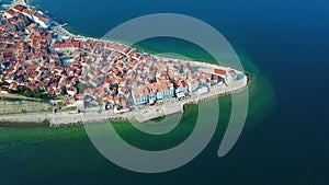 4K. Flight over old city Piran in the morning, aerial top panoramic view