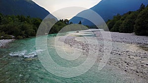 4K. Flight and takeoff above Soca river in Slovenia at sunset. Julian Alps, Soca Valley, Bovec district